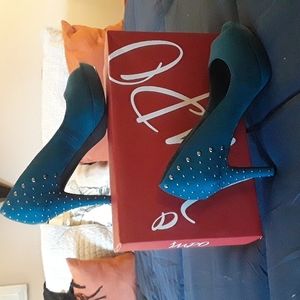 Open toe heels never worn. Impo brand peacock blue with pewter studs on heels.